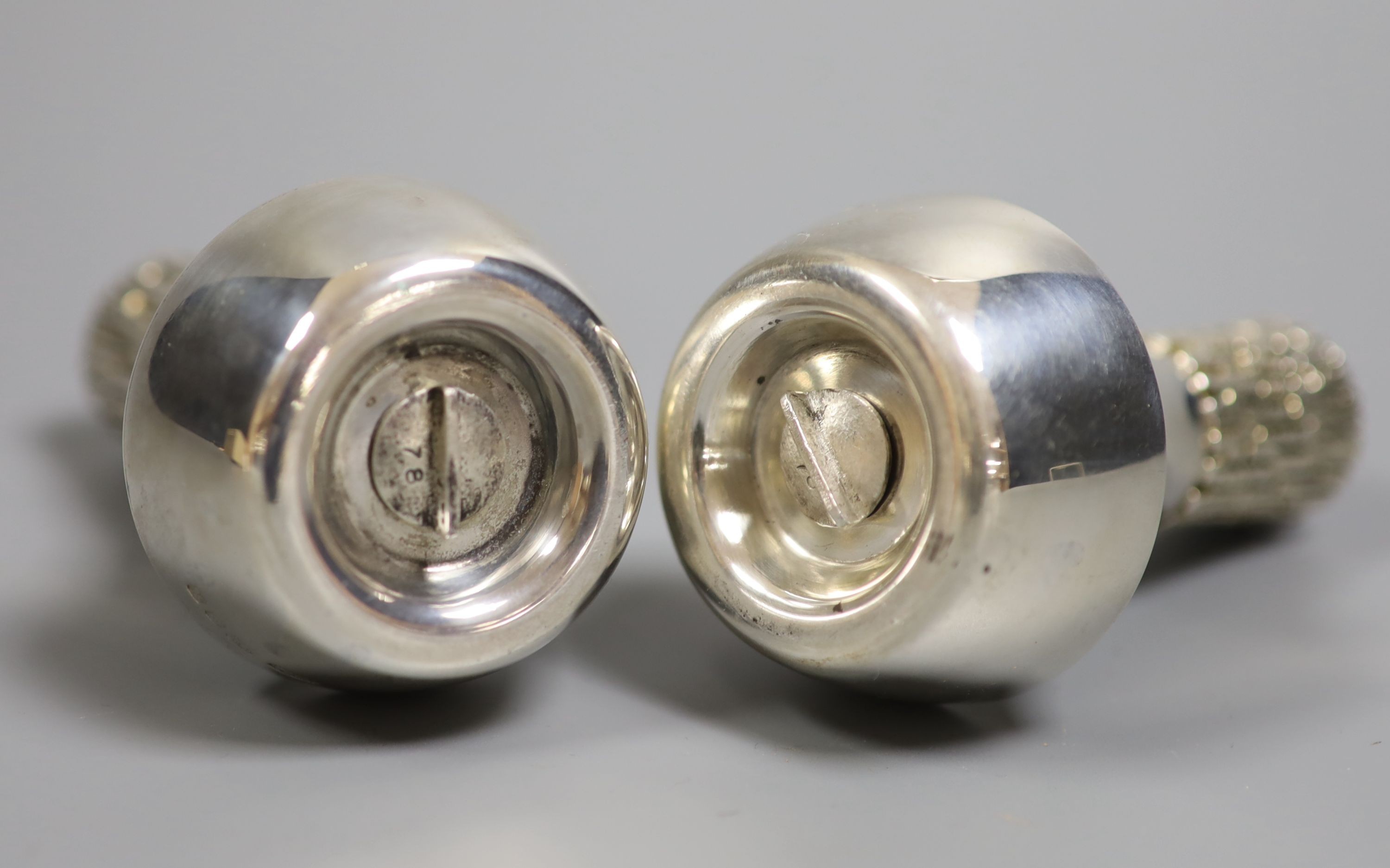 A modern pair of part textured silver condiments by Christopher Nigel Lawrence, London, 1982, 93mm, gross 141 grams.